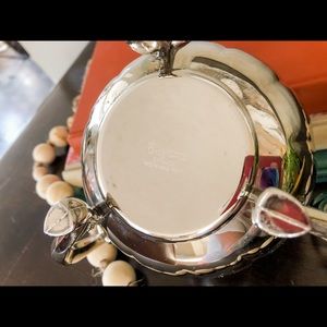 Silver plate lotus flower candle holder.